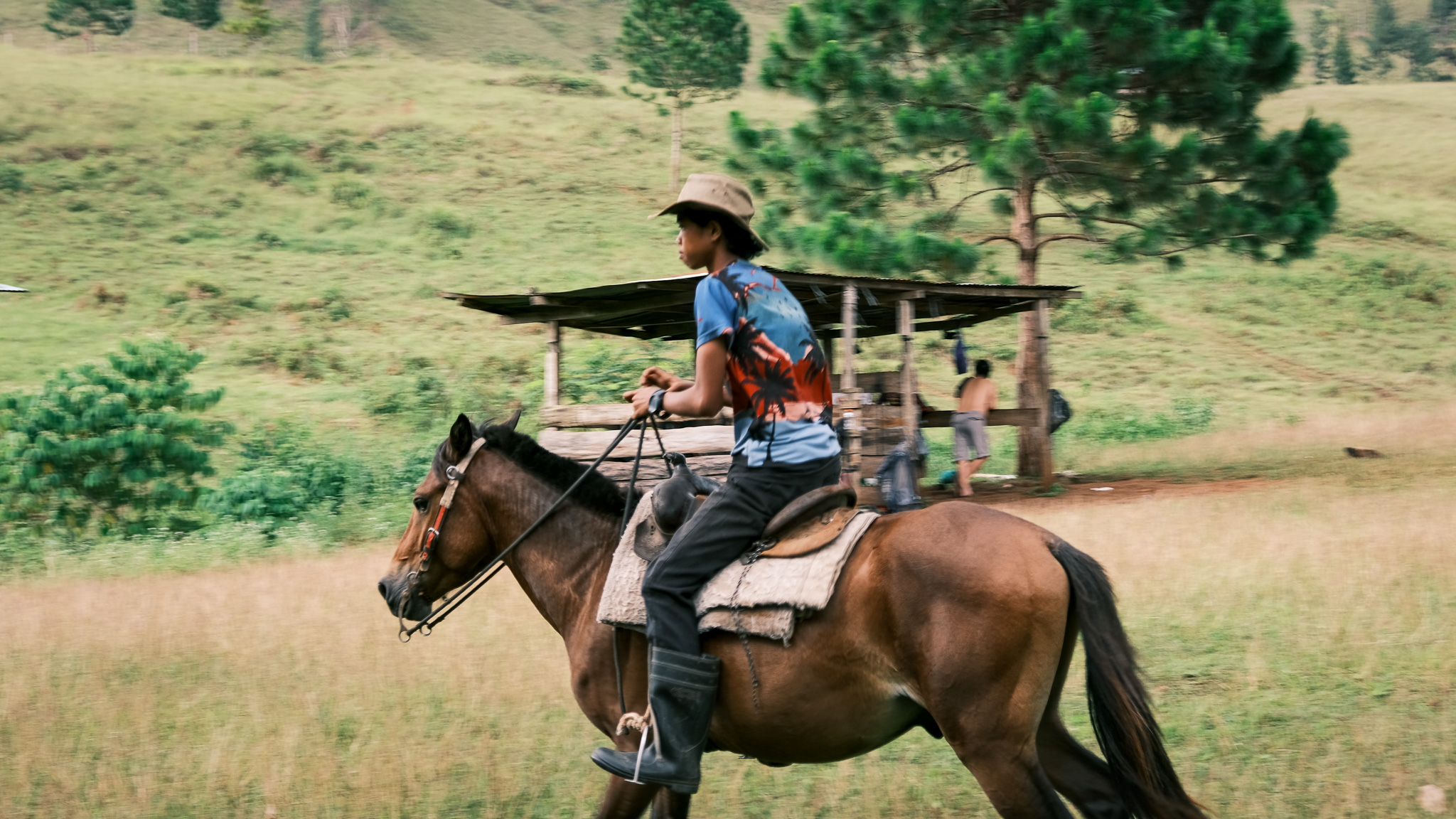 A man riding a horse in Sabangan campsite